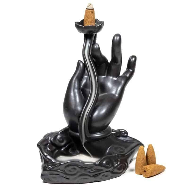 Поставка за тамян Lotus Hand с ръка, държаща ароматна пръчка.