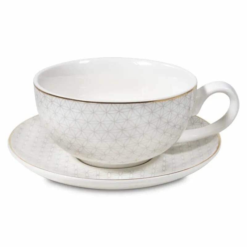 A Порцеланов мини чайник с чаша Дървото на живота cup and saucer on a white background.