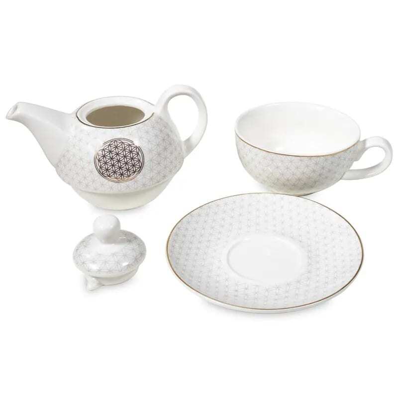A Порцеланов мини чайник с чаша Дървото на живота, cup and saucer on a white surface.