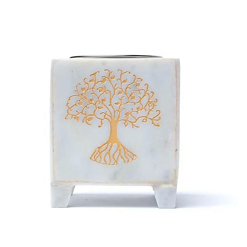 Тамянник Дървото на живота от бял мрамор with a tree of life design on it.