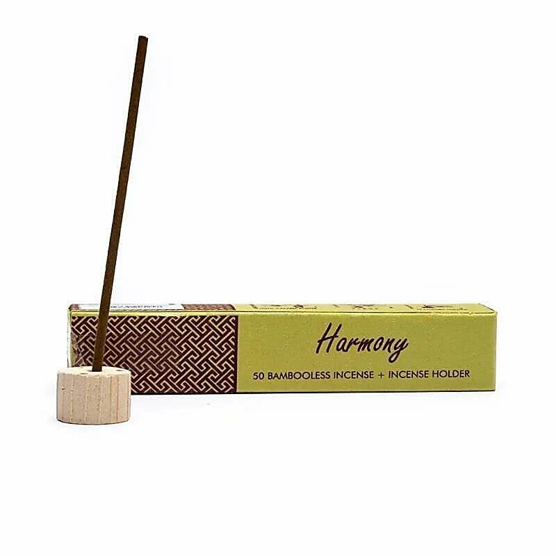 A Тамянови пръчици Хармония с аромат на цветен букет on top of a box.